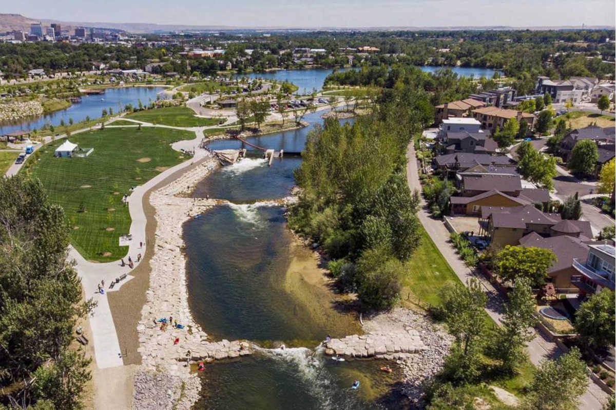 Aerial view of Garden City, Idaho, showing the Boise River Greenbelt, parks, and nearby residential neighborhoods.